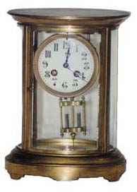 French oval crystal regulator. — Antique Clocks Price Guide