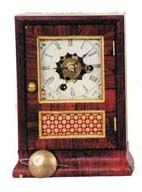 Daniel Pratt &amp; Sons miniature cottage clock, 9 inches high. — Antique Clocks Price Guide