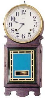 E. Ingraham hanging clock "Navane", ca 1918. natural grain rubbed mahogany case, 20 inches high. — Antique Clocks Price Guide