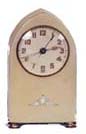 German miniature musical alarm clock, 5 1/2 inches high. — Antique Clocks Price Guide