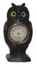 Owl in cast iron case. Has great detail in the casting, feathers, feet, beak and has glass eyes. — Antique Clocks Price Guide