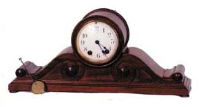 Seth Thomas tambour "Peer", ca 1913. Very appealing case in mahogany,17 1/2 inches wide, 8 inches high. — Antique Clocks Price Guide