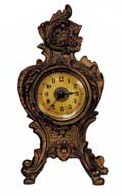 New Haven novelty clock, "Trianon", ca 1900. 7 1/2 inch bronze case, finish dull. — Antique Clocks Price Guide
