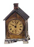 Seth Thomas "Lodge", ca 1892. 7 inch metal case, gold gilt on the front, brass back, nickel otherwise. — Antique Clocks Price Guide