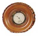 New Haven novelty, cross section of a log, 5 1/4 inches in diameter, called "Bark Art". — Antique Clocks Price Guide