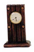 Ansonia Clock Co. novelty. A block of wood on a base. — Antique Clocks Price Guide