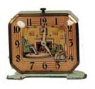 Lux Clock Co. animated novelty alarm clock. Ticking of clock turns the spinning wheel and foot petal. — Antique Clocks Price Guide