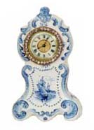 Ansonia Clock Co. blue delf case, 8 inches high. — Antique Clocks Price Guide