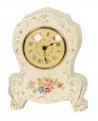 Lux Clock Co. porcelain clock, 7 inches high. — Antique Clocks Price Guide