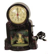 Mastercrafter "Swinging Bird". Clock is running, bird swings, light burns. — Antique Clocks Price Guide