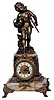 Waterbury Clock Co. clock with a standing statue.