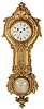 French cartel with barometer and thermometer. 26-inch metal case with gold paint over the metal.