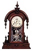 Wm. L. Gilbert walnut, "Parisian", ca 1879. The case is 24 inches high, extremely clean and highly polished.