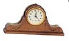 Ansonia Clock Co. novelty clock, metal case, shape of tambour, 7 1/2 inches wide.