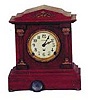 Seth Thomas "Berkley", ca 1909. Mahogany case with gold plated metal trimmings, stands 11 1/2 inches high, 10 inches wide.