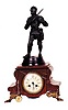 French statue clock, red marble case with white veins, statue of a Roman soldier, standing 18 1/2 inches high.