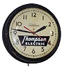 Telechron round electric advertising clock, running.