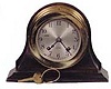 Chelsea Clock Co. ships bell with display case, 6 1/4 inches high and 8 1/4 inches wide.