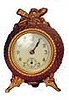 Jennings Bros. novelty clock. 4 inch case has been repainted, has an easel stand.