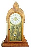 E.N. Welch walnut parlor clock, walnut case 21 inches high.