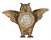 Owl in a brass case marked only "Made in USA".