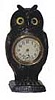 Owl in cast iron case. Has great detail in the casting, feathers, feet, beak and has glass eyes.