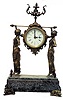 Bronze and marble French clock. The clock is being carried by 2 Egyptian ladies.