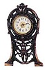 Standing novelty clock, 9 1/2 inches high.
