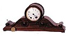 Seth Thomas tambour "Peer", ca 1913. Very appealing case in mahogany,17 1/2 inches wide, 8 inches high.
