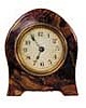 Lux novelty clock, pearl or "Ivoreth" material. Case is 4 inches high, easel back.