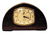 E. Ingraham Co. 8 day alarm clock in a wood case, 9 1/2 inches wide by 6 inches high.