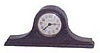 Seth Thomas miniature tambour clock in a wood case, 9 inches wide and4 inches high.