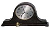 Junghans shelf clock in a tambour style case.