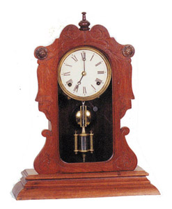 E.N. Welch wood mantle clock, — Antique Clocks Price Guide