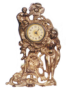 Novelty shelf clock, stamped "Wild Rose" on the 13 inch metal case. — Antique Clocks Price Guide
