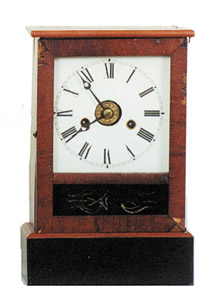 The Terry Clock Co., Waterbury, Conn., ca 1873. This 12 inch walnut clock is called "Cottage No. 2". — Antique Clocks Price Guide