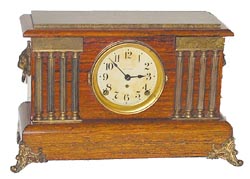 Seth Thomas Clock Co. wood case, mahogany adamantine finish. — Antique Clocks Price Guide