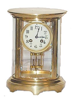 French oval crystal regulator. — Antique Clocks Price Guide
