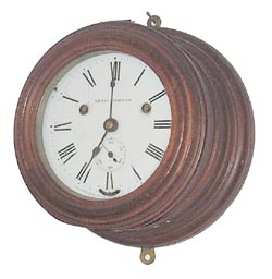 Rare and early, Seth Thomas ship's bell clock in a wood case, 4 3/4 inches high, and 8 3/4 inches wide. — Antique Clocks Price Guide