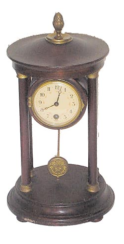 Hamburg-American Clock Co. round novelty clock, ca 1910. — Antique Clocks Price Guide