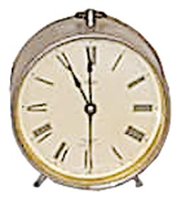 Parker Clock Co. alarm clock in a nickel case, brass bell on the back, running. — Antique Clocks Price Guide