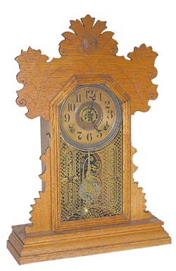 E. Ingraham Clock Co. mantle clock, one of their "Flower" line, this one is the "Violet", ca 1896. — Antique Clocks Price Guide
