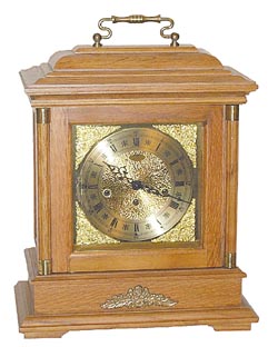 Howard Miller cabinet clock, with a bracket clock look. — Antique Clocks Price Guide