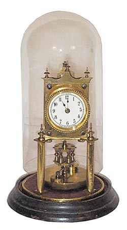 German Anniversary clock, disc pendulum, with a rare wood base. — Antique Clocks Price Guide