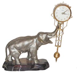 Linden swing arm on an elephant base. — Antique Clocks Price Guide
