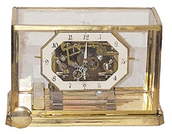Crystal regulator type, multi functional clock. — Antique Clocks Price Guide