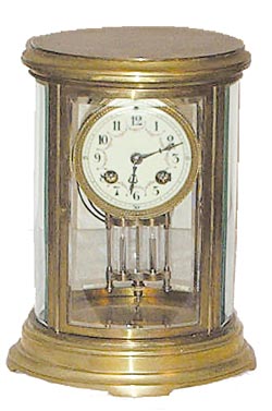 French Oval crystal regulator. 8 day movement is signed, "Made in France", and "L. Marti &amp; Sons". — Antique Clocks Price Guide