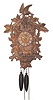 Large carved cuckoo clock with fox, bird, and grapes. 24 inches high.