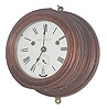 Rare and early, Seth Thomas ship's bell clock in a wood case, 4 3/4 inches high, and 8 3/4 inches wide.