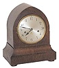 Junghans oak beehive case, with a large 8 day brass movement, striking Westminster chimes on quarters, striking on 5 rods, with 8 hammers.